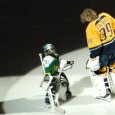 Lindback creates adorable moment before game… Lindback shares an adorable moment with a young goalie before the game.