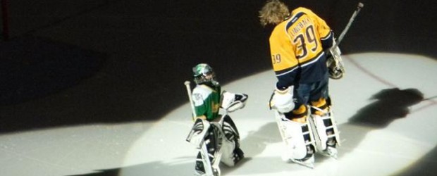 Lindback creates adorable moment before game… Lindback shares an adorable moment with a young goalie before the game.