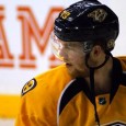 Ryan Ellis lays out Wayne Simmonds during Saturday's game against the Philadelphia Flyers.