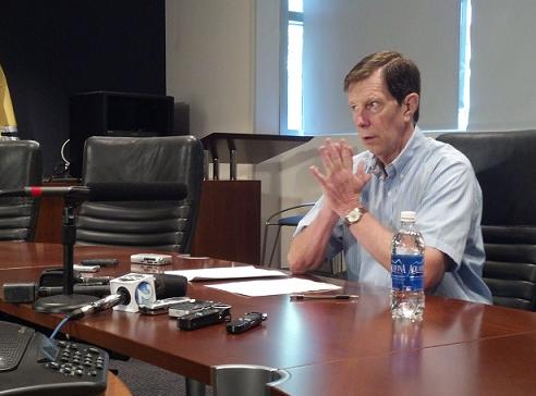 Poile at desk (Jeremy K Gover)