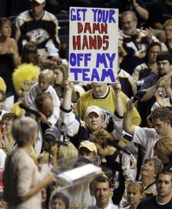 Predators Rally Hockey Nashville Predators fan Jeremy K. Gover holds up a sign at a rally on July 19, 2007, in Nashville, Tenn., held by a local group trying to sell enough season tickets to keep the Predators' lease in effect after the 2007-08 season. (AP Photo/Mark Humphrey)